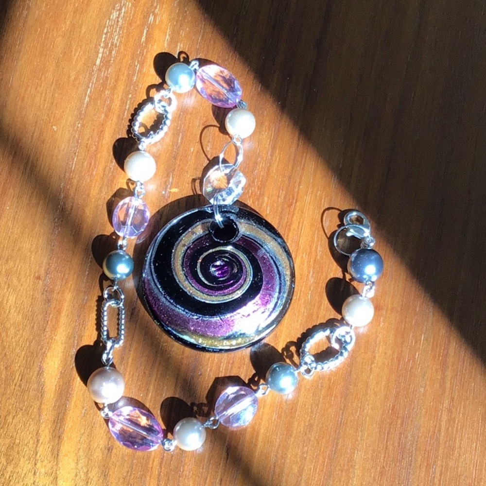 Spiral Glass Art and Pearl Sun Satcher